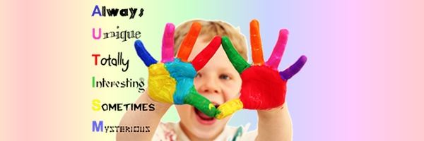 Child laughing with multi-colored paint on his hands