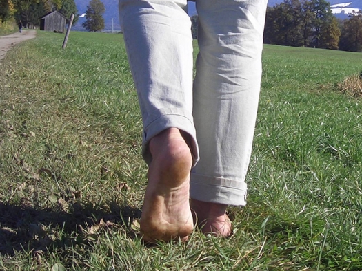 walking barefoot in the grass