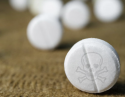 aspirin with skull and bones printed on it