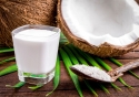 coconut and glass of coconut milk