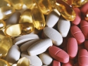 Supplements: many gel capsules and white and red tablets